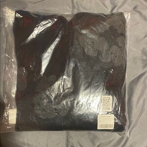 Black and Red Floral Patterned Garment